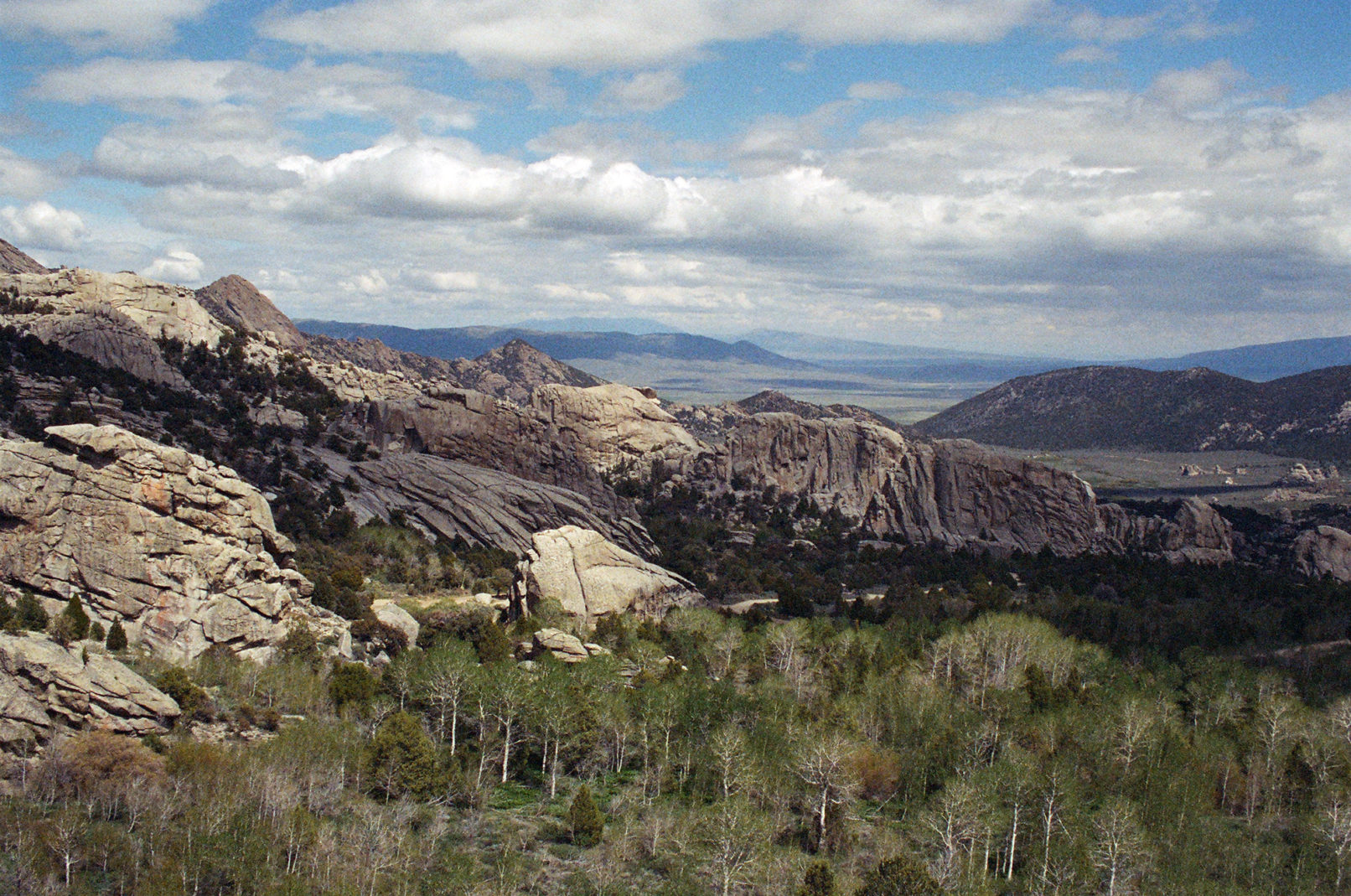 A wide shot of City of Rocks, ID marked with outcroppings of rock formations.